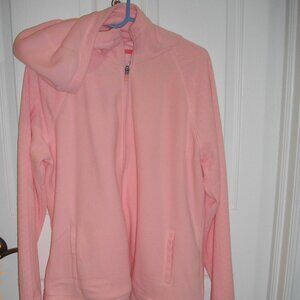 Women's Tek Gear pink hooded mixed pattern fleece zip-up jacket.